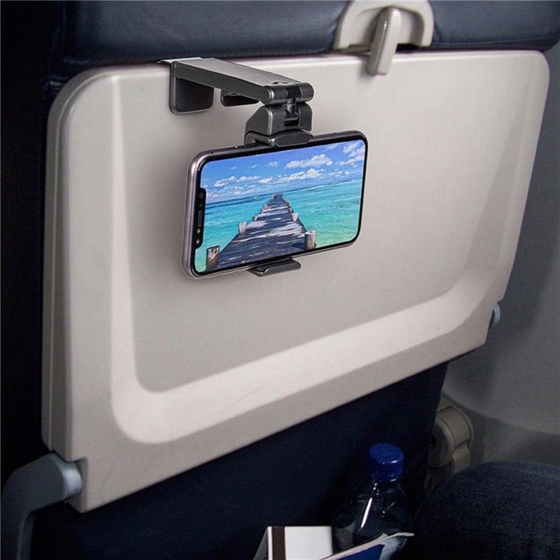 Phone holder , clips onto you aeroplane tray table infront of you allowing you to watch your favourite films hands free.
