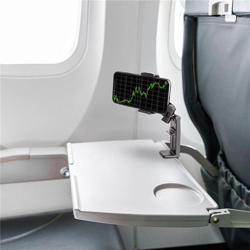 Phone holder , clips onto you aeroplane tray table infront of you allowing you to watch your favourite films hands free.