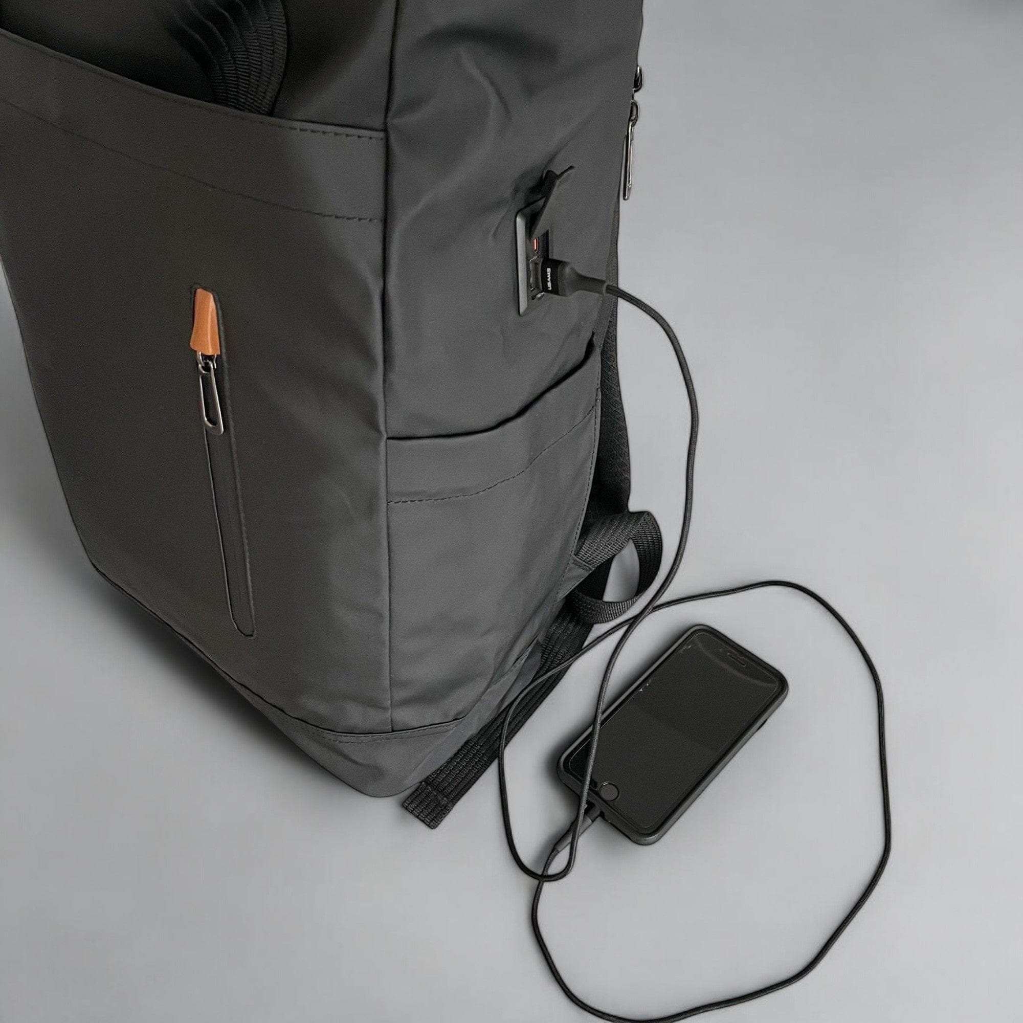 The Commuter Backpack by Travel Companion. This Backpack comes with an expandable rolltop design , padded rear laptop compartment which opens at 90 degrees giving you east access. It also comes with a built in USB charging port ensuring you stay connected on the go. It is built with durable and waterproof materials making it your perfect commuting companion.