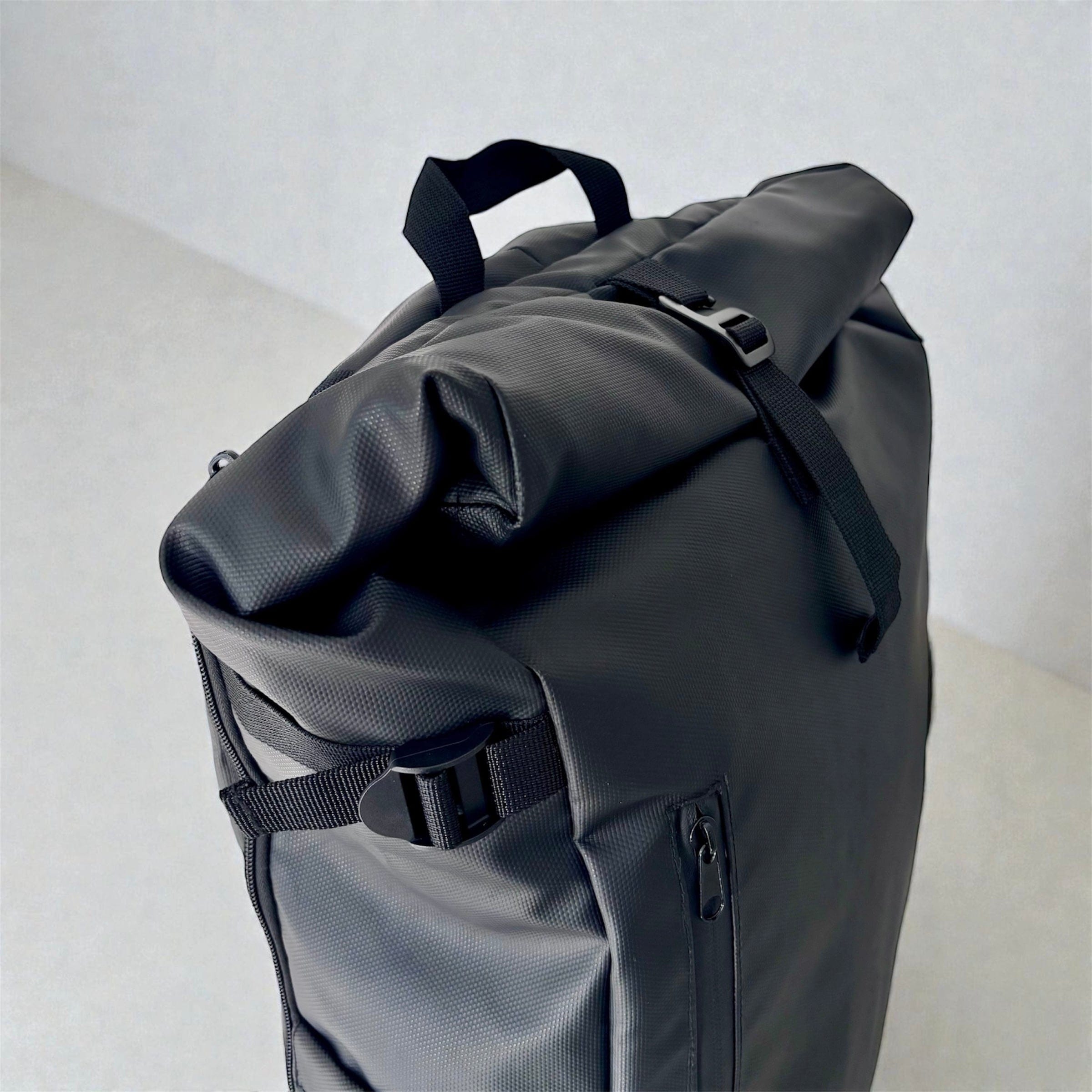 Travel Companion Black The Rolltop Backpack